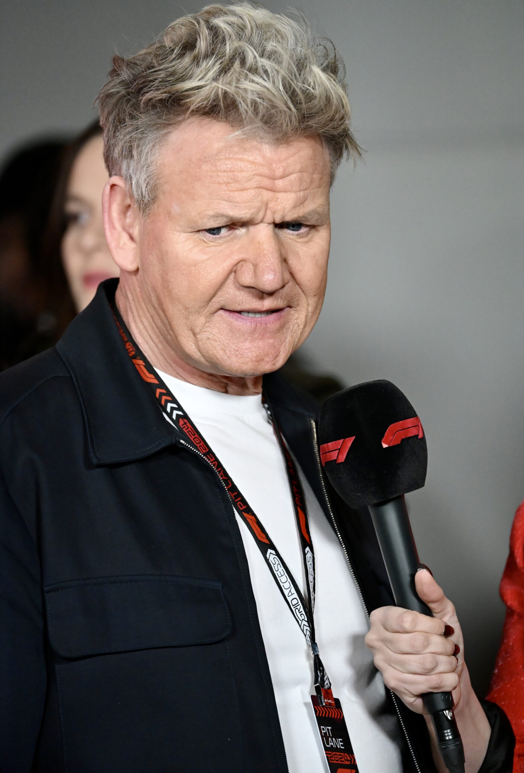 Gordon Ramsay speaking into a microphone