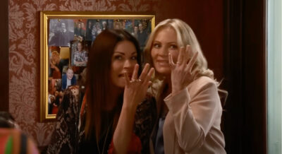 Carla and Lisa showing off engagement rings
