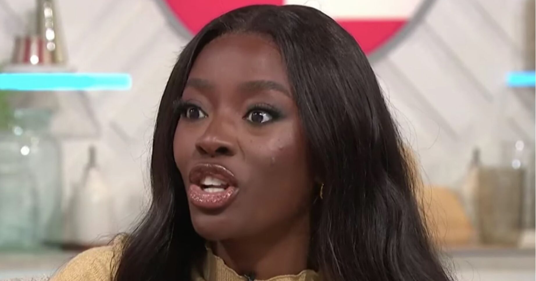 AJ Odudu looking serious