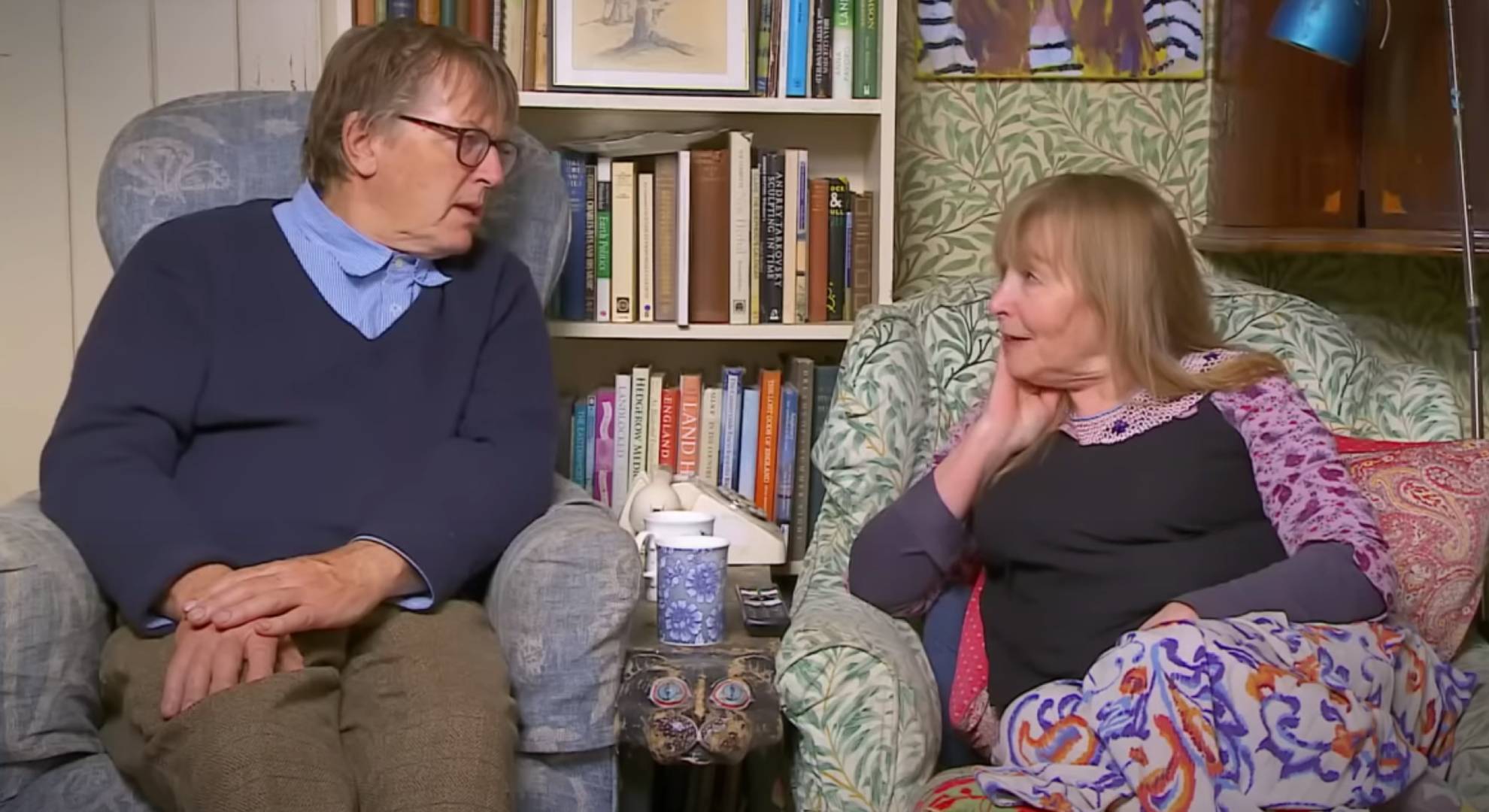 Giles and Mary gaze at one another