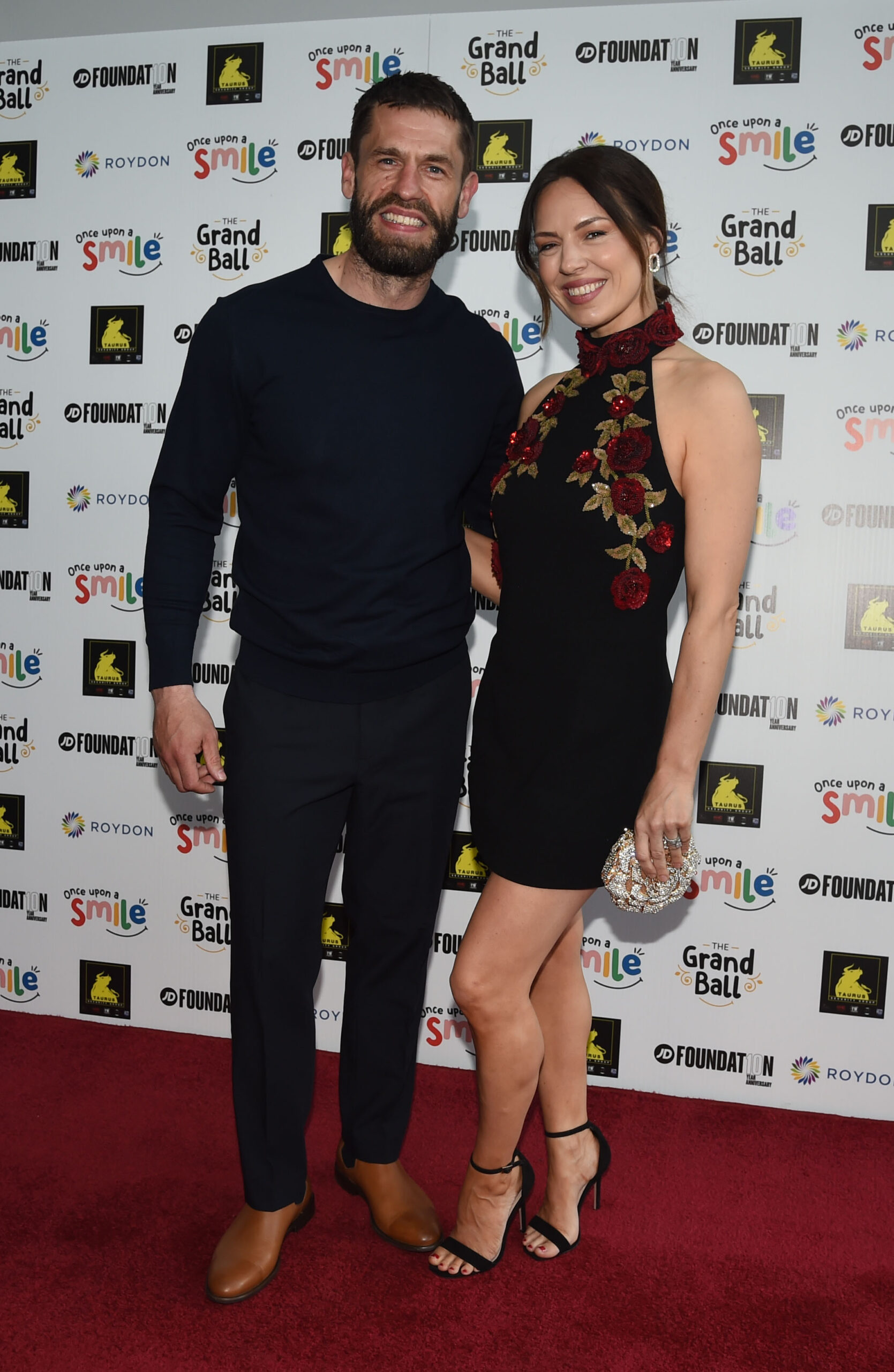  Kelvin and his wife Liz posing on red carpet