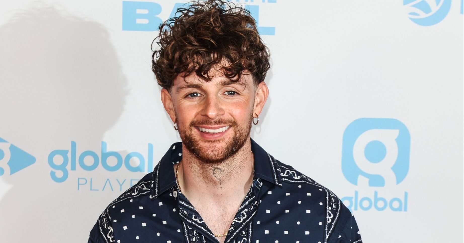 Tom Grennan smiling