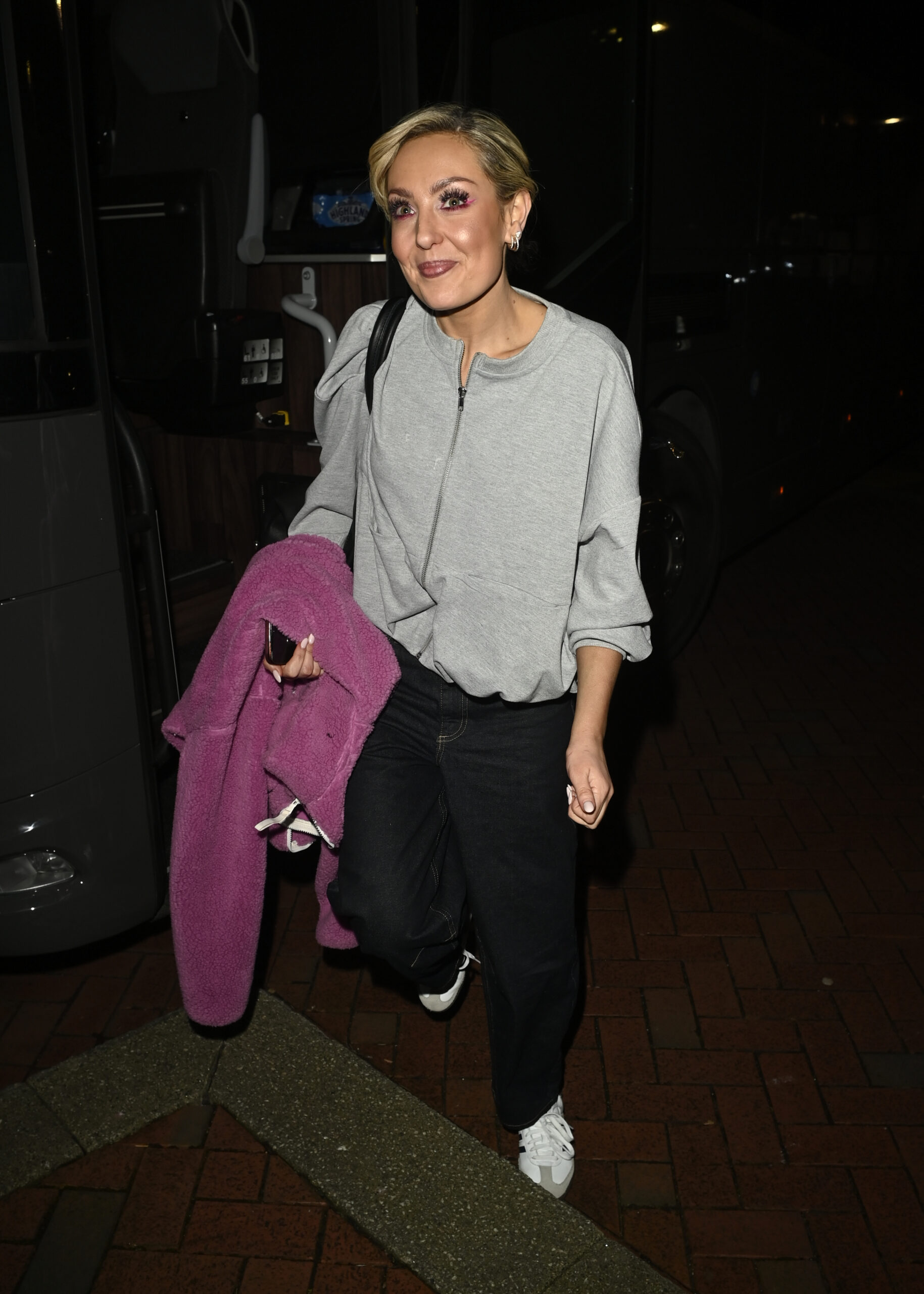 Amy Dowden wearing grey walking.