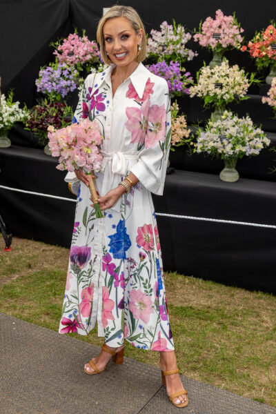 Amy Dowden in a floral dress at the Chelsea Flower Show