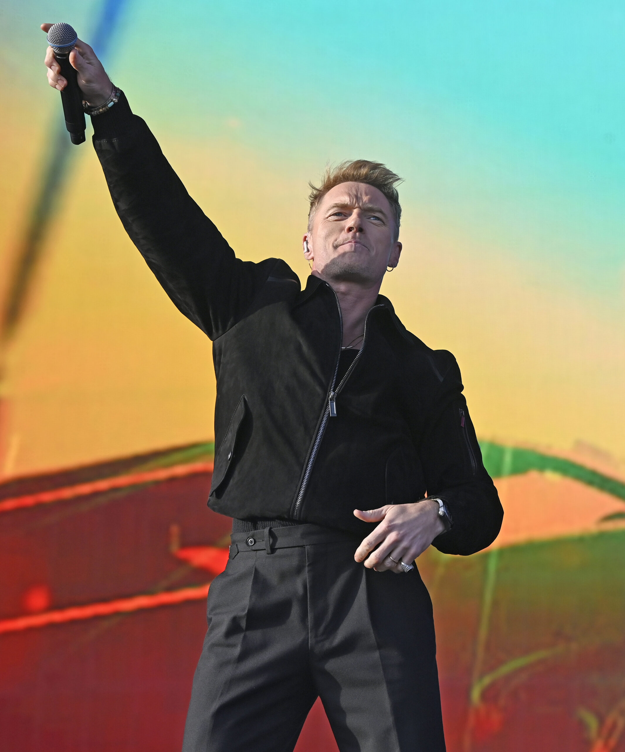 Ronan Keating performing on stage
