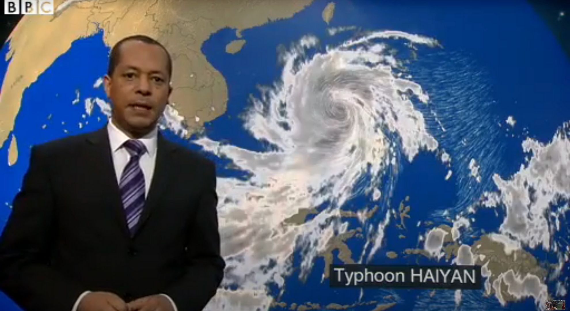 Jay Wynne presenting BBC weather