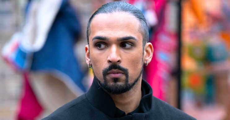 Ravi looks stressed on EastEnders (Credit: BBC/Composite: ED!)