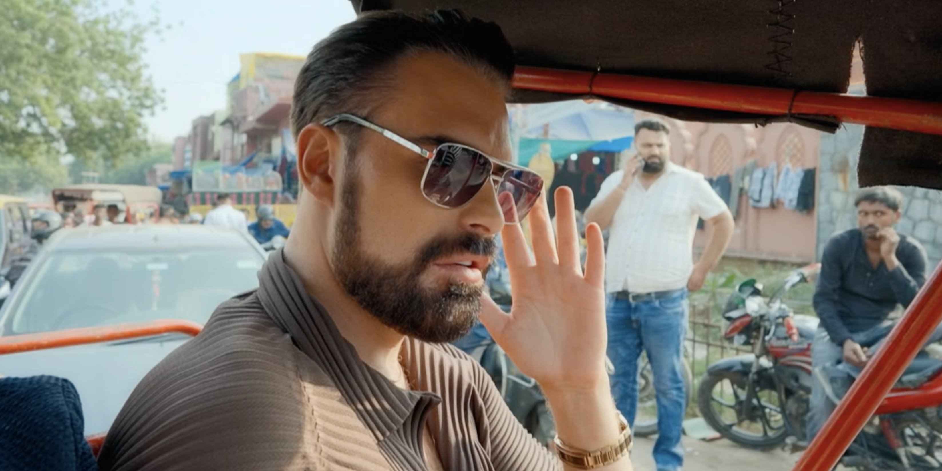 Rylan Clark looking annoyed in India.