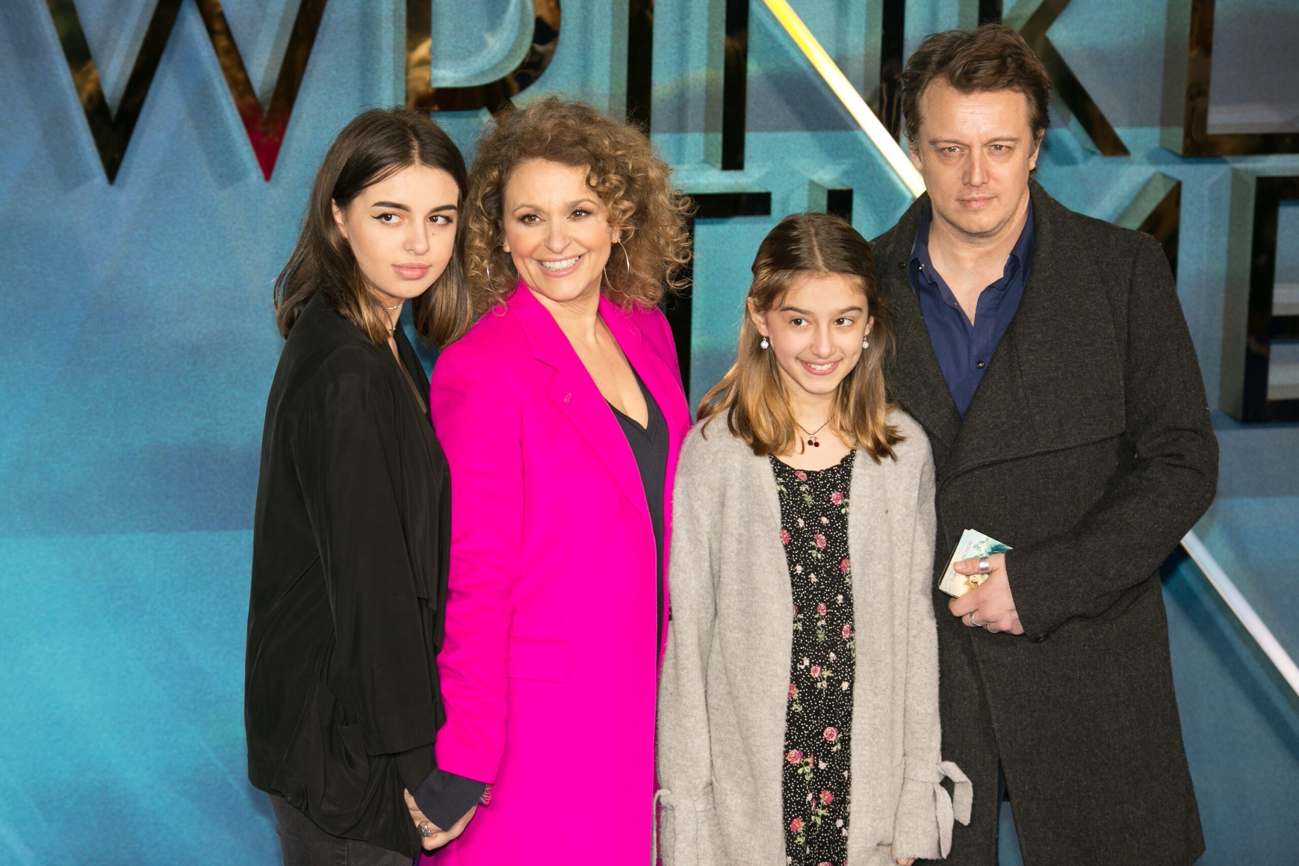 Nadia and her husband and children