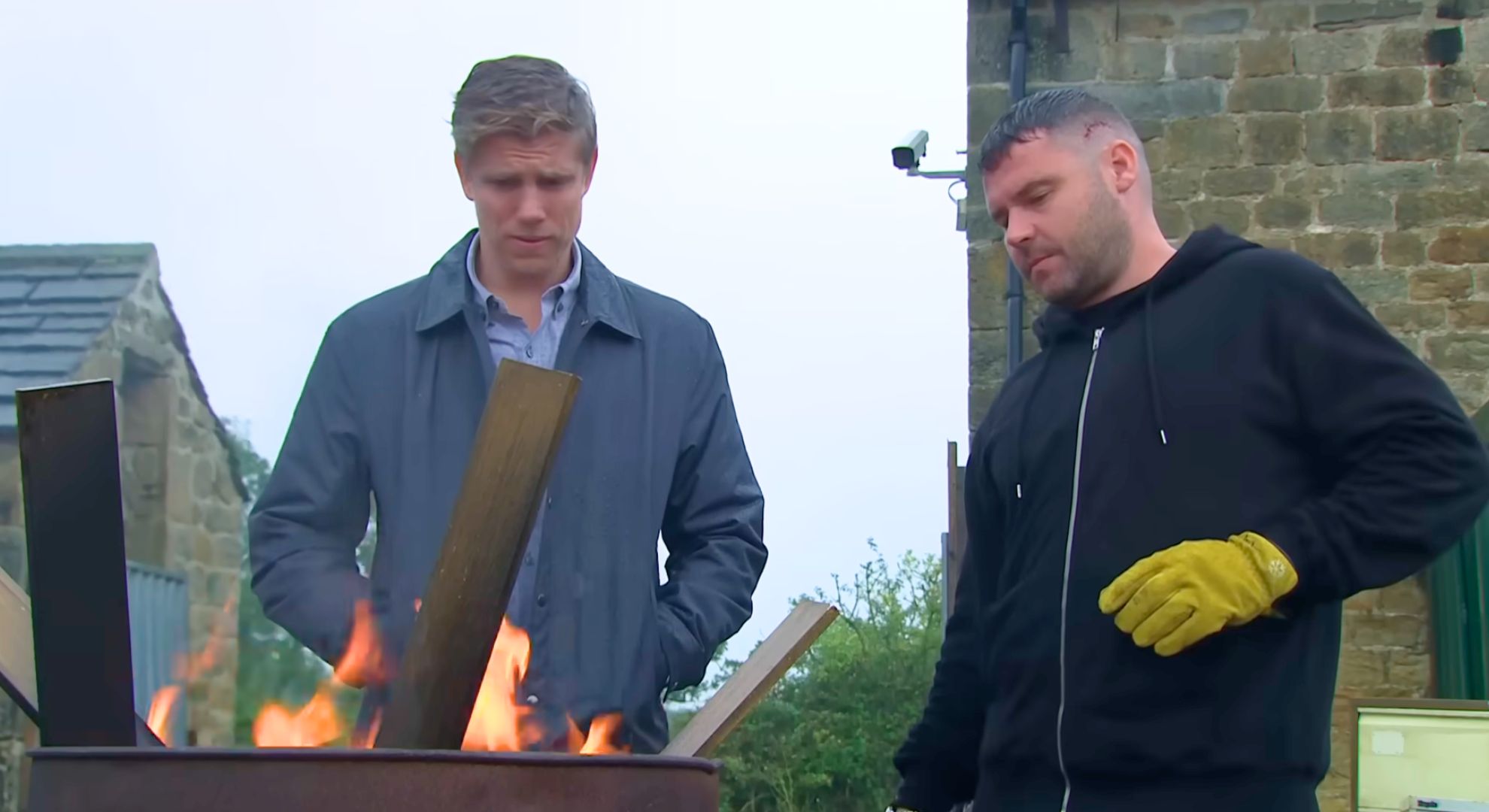 Robert saw Aaron burning John's things and stepped in (Credit: ITV)