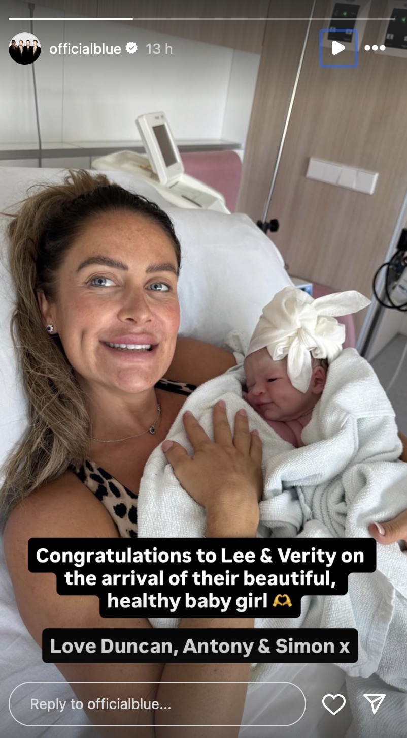 Lee Ryan's wife Verity holding their baby girl