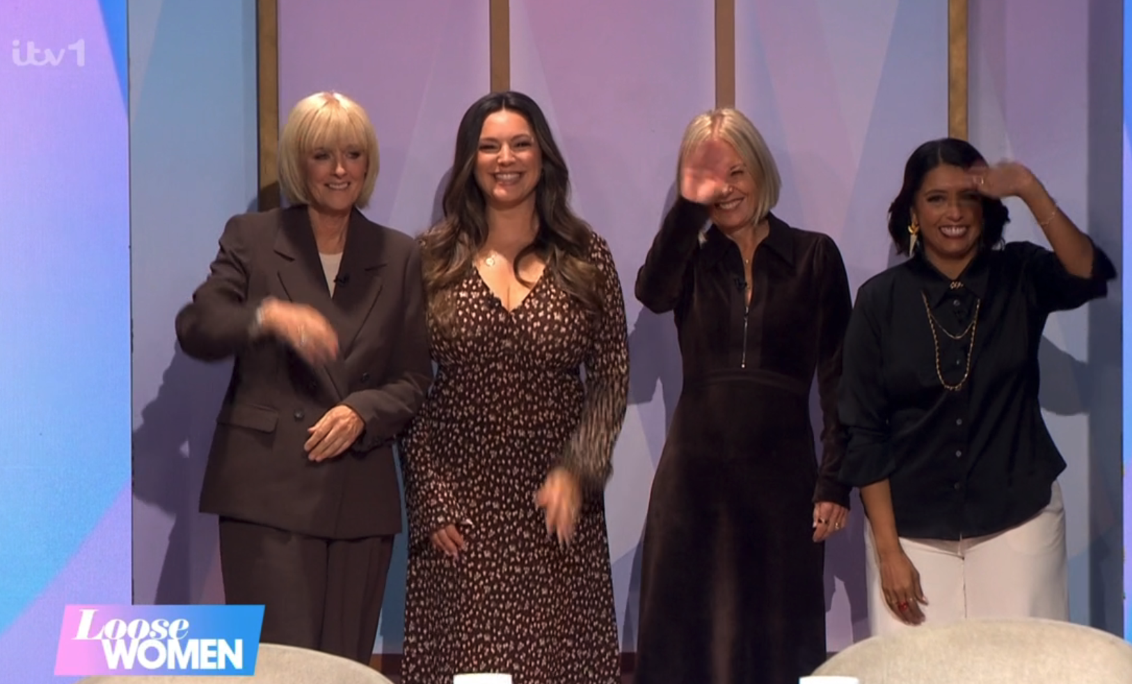 Loose Women panel emerging from the sliding doors