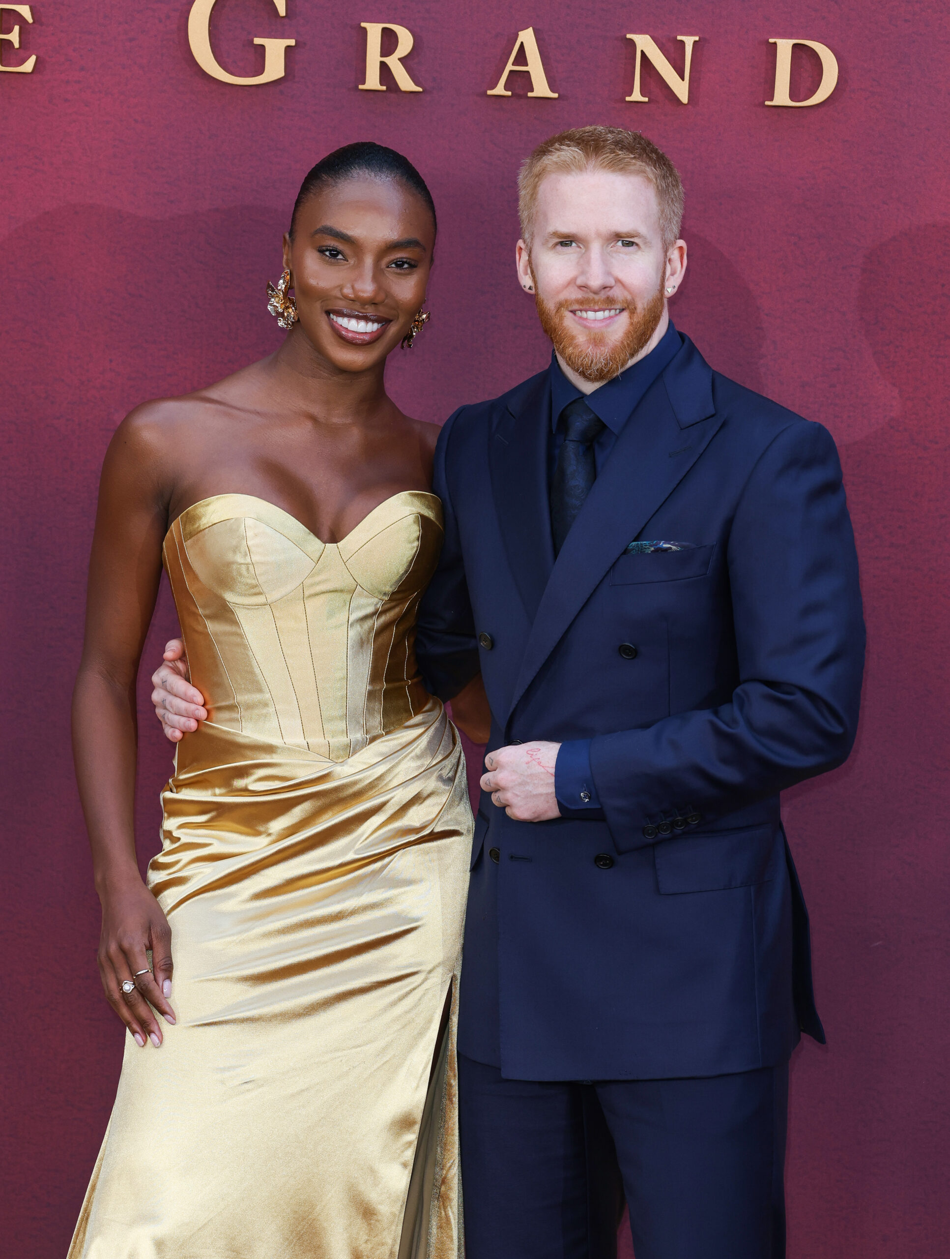 Neil Jones and Chyna Mills at the premiere of Downton Abbey: The Grand Finale.
