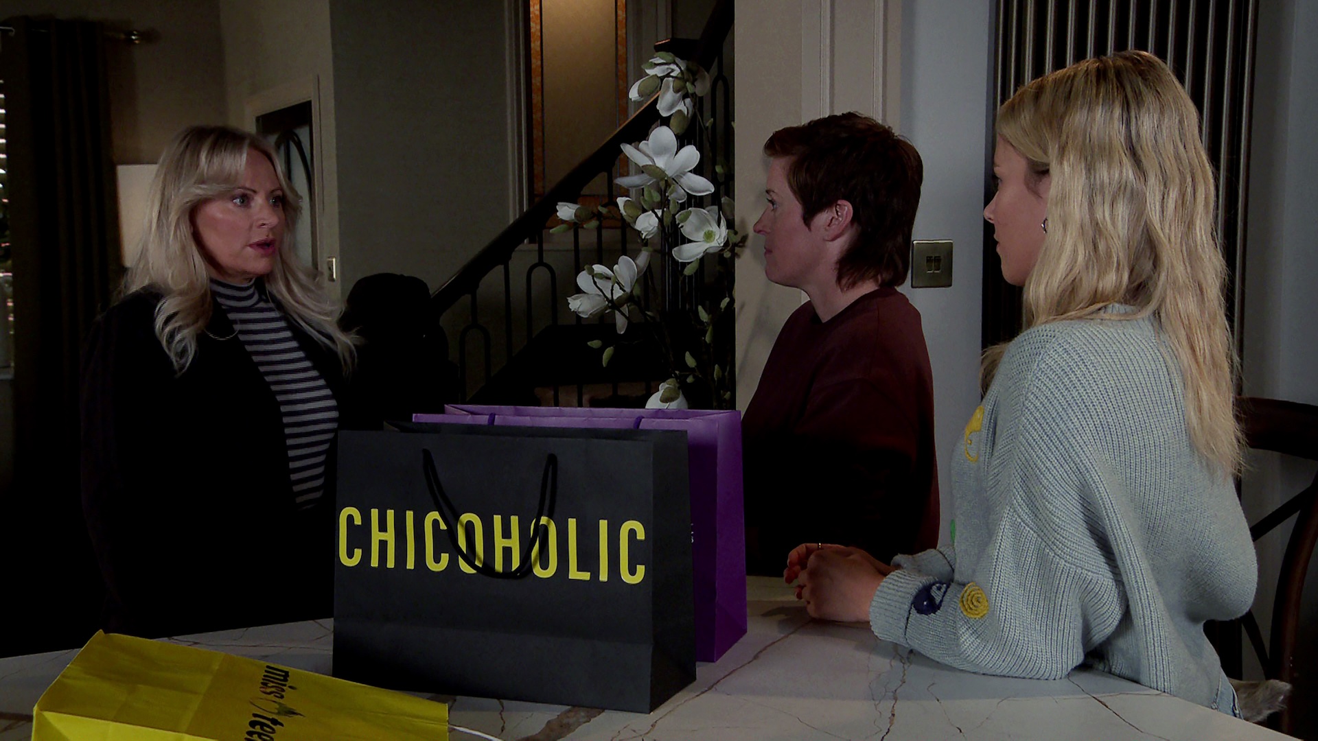 Coronation Street's Lisa looking angrily at guilty Becky and Betsy
