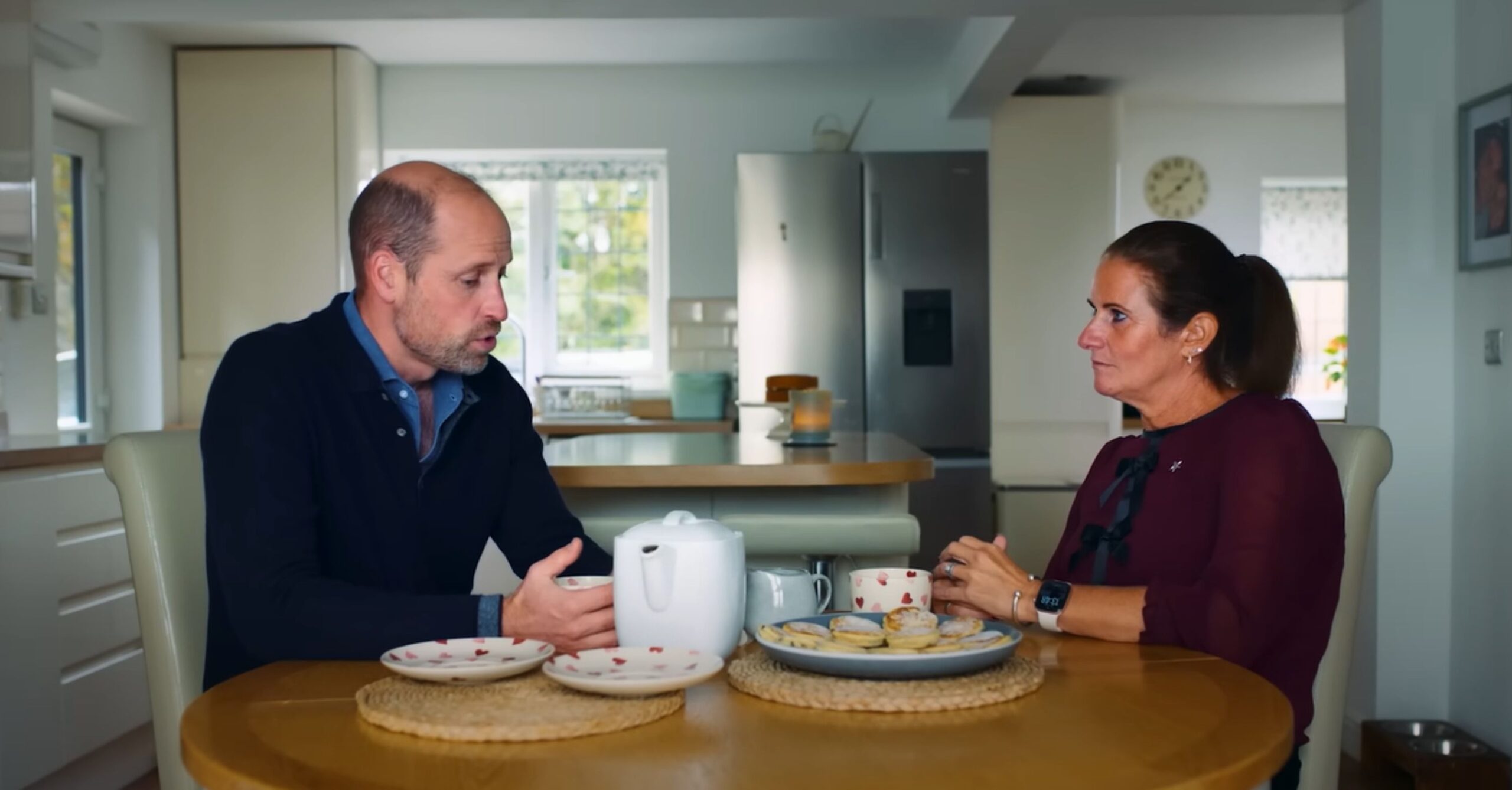 Prince William talking to Rhian Mannings about her husband's suicide