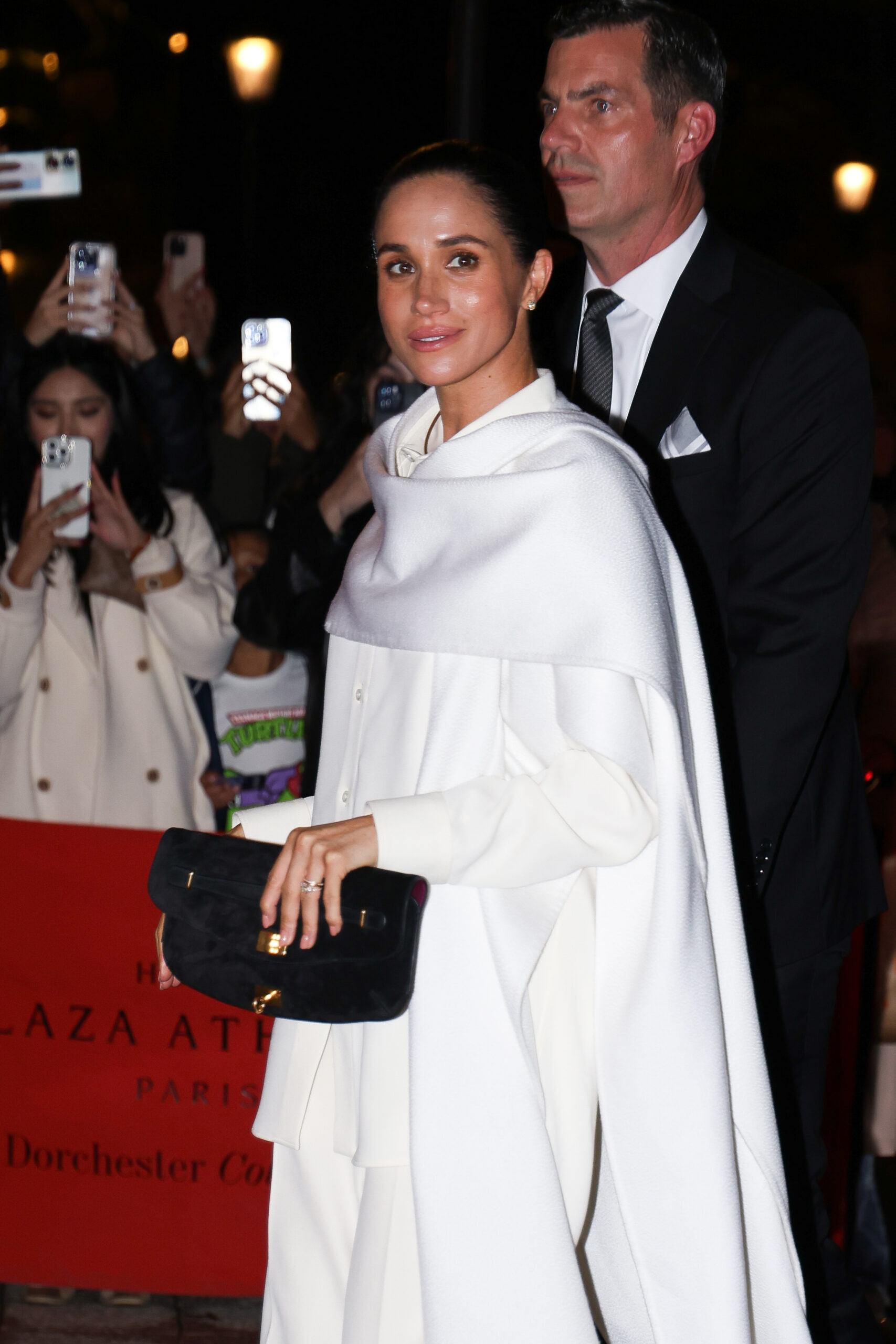 Meghan Markle in all white during Paris Fashion Week