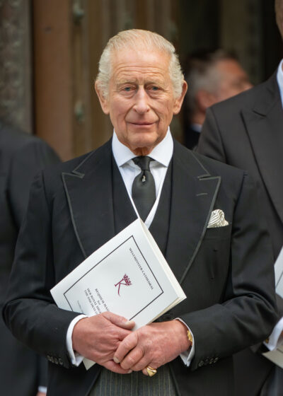 King Charles in a black suit