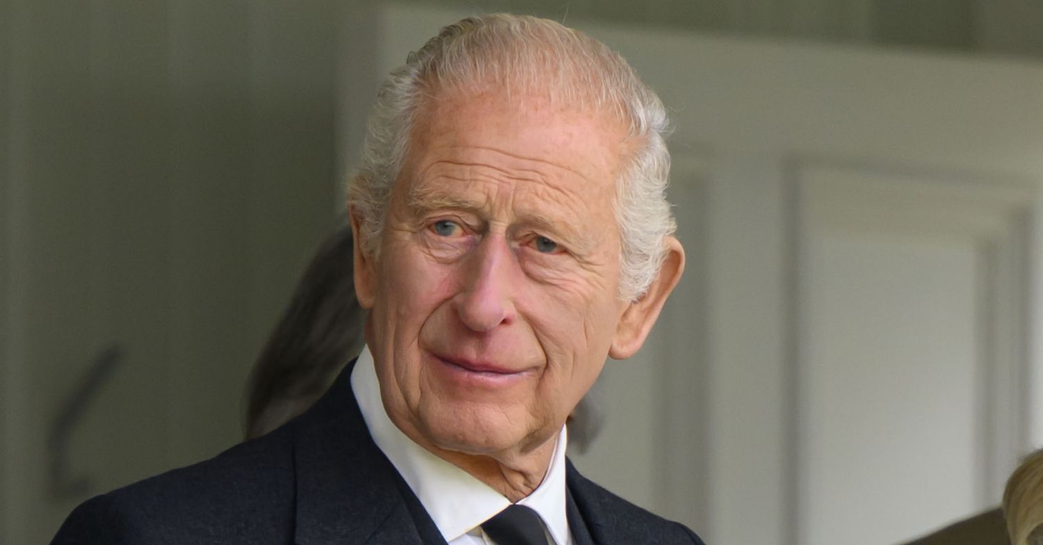 King Charles smiling during royal appearance