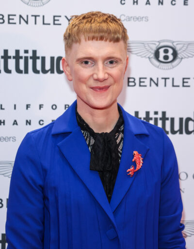 Owain posing on red carpet