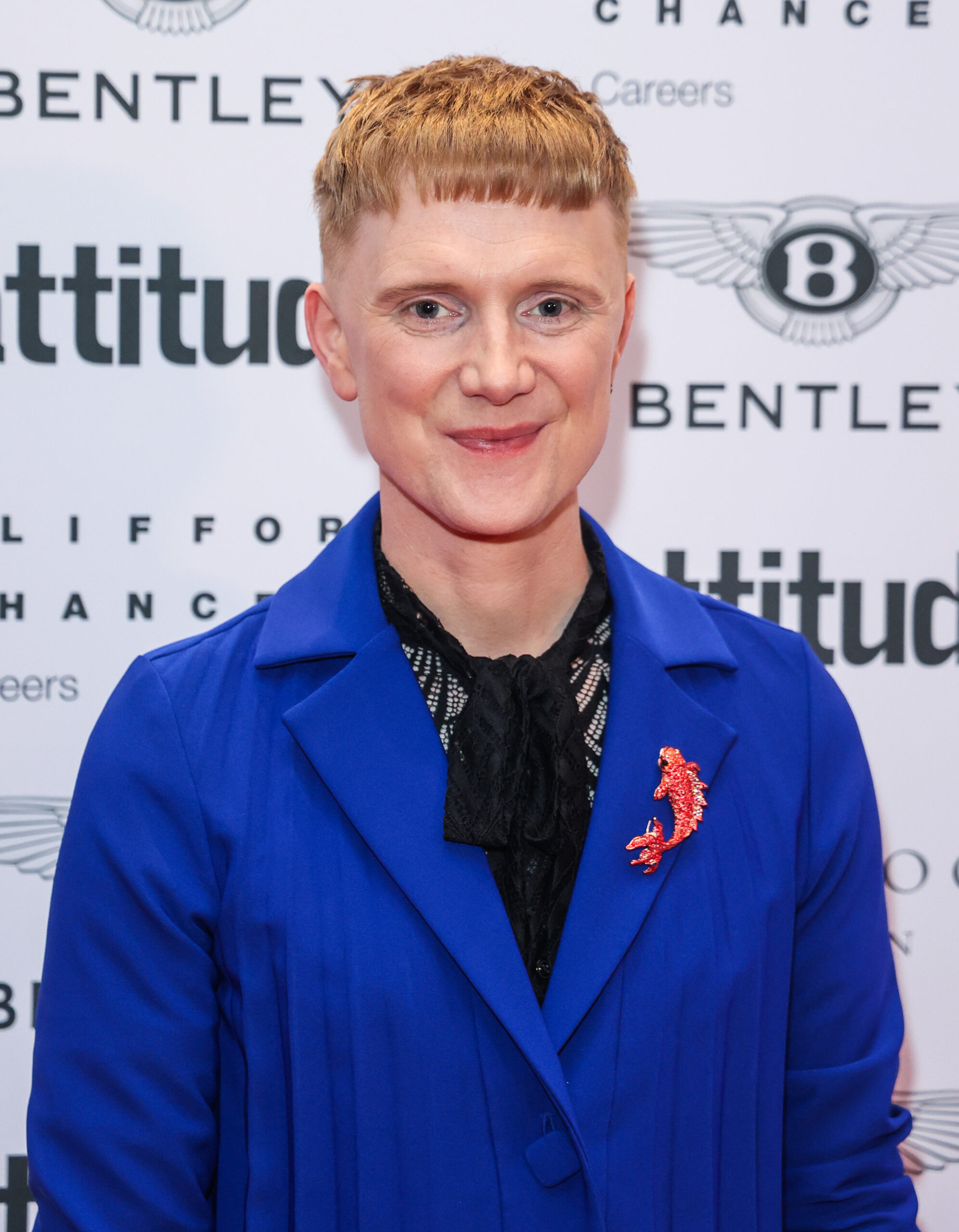 Owain posing on red carpet 