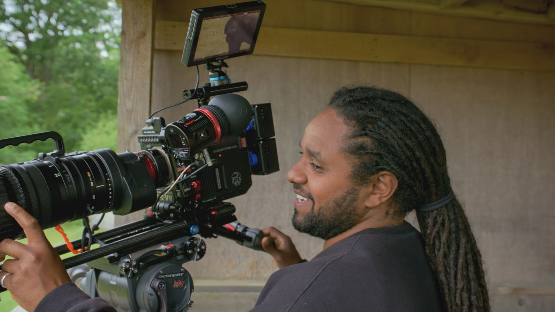 Hamza Yassin using his camera 