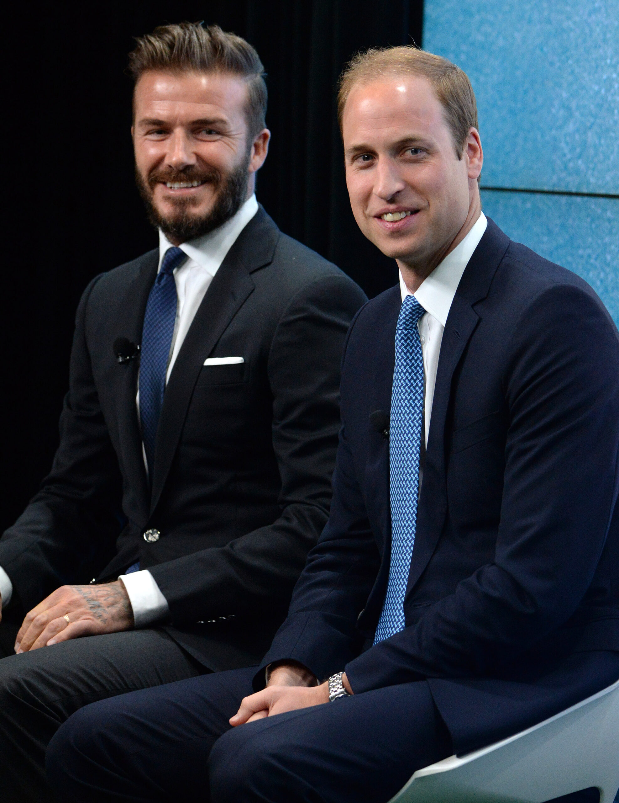 David Beckham with Prince William smiling at camera