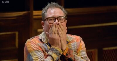 Alan Carr laughing