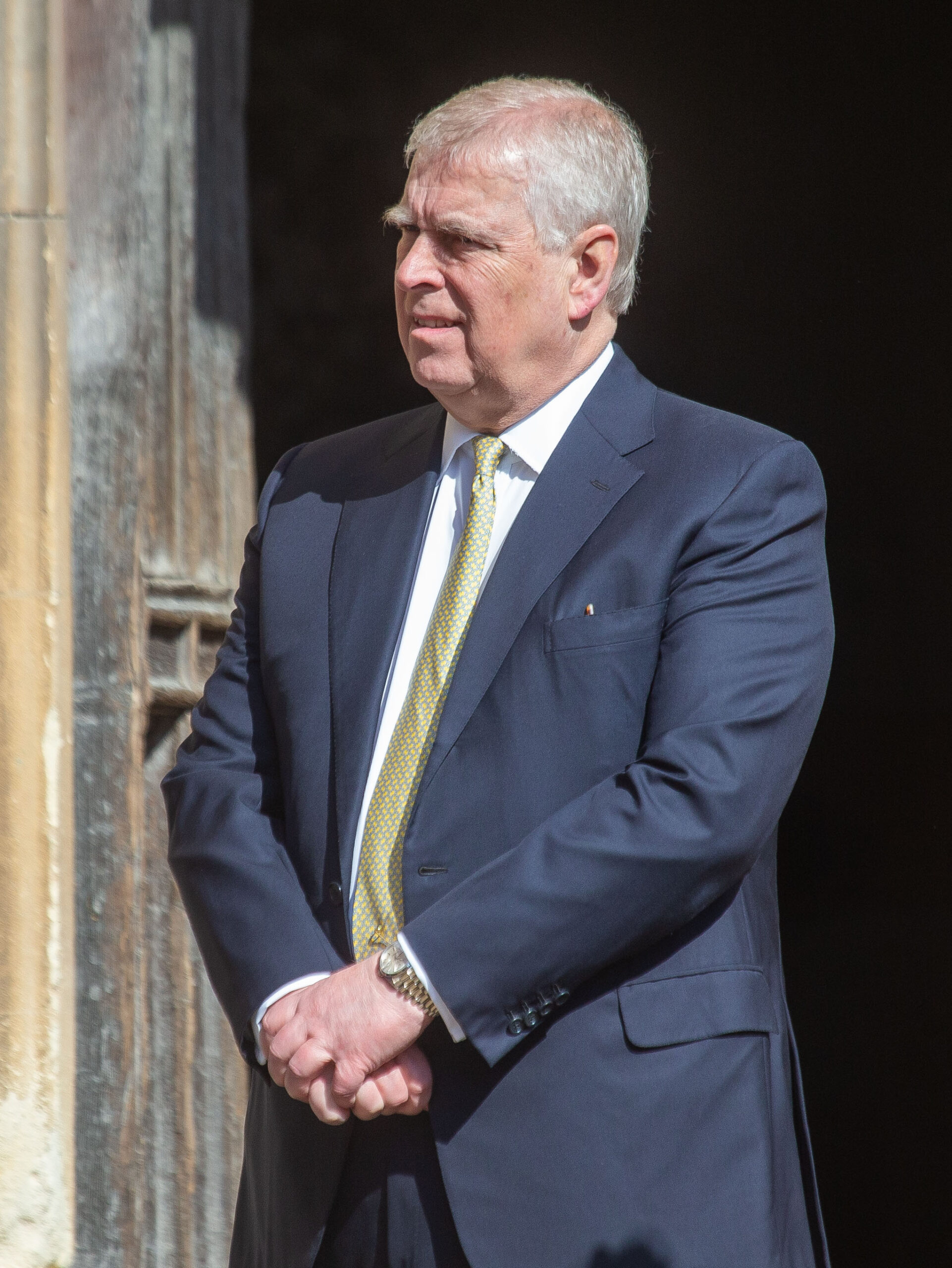 Prince Andrew wearing a navy suit
