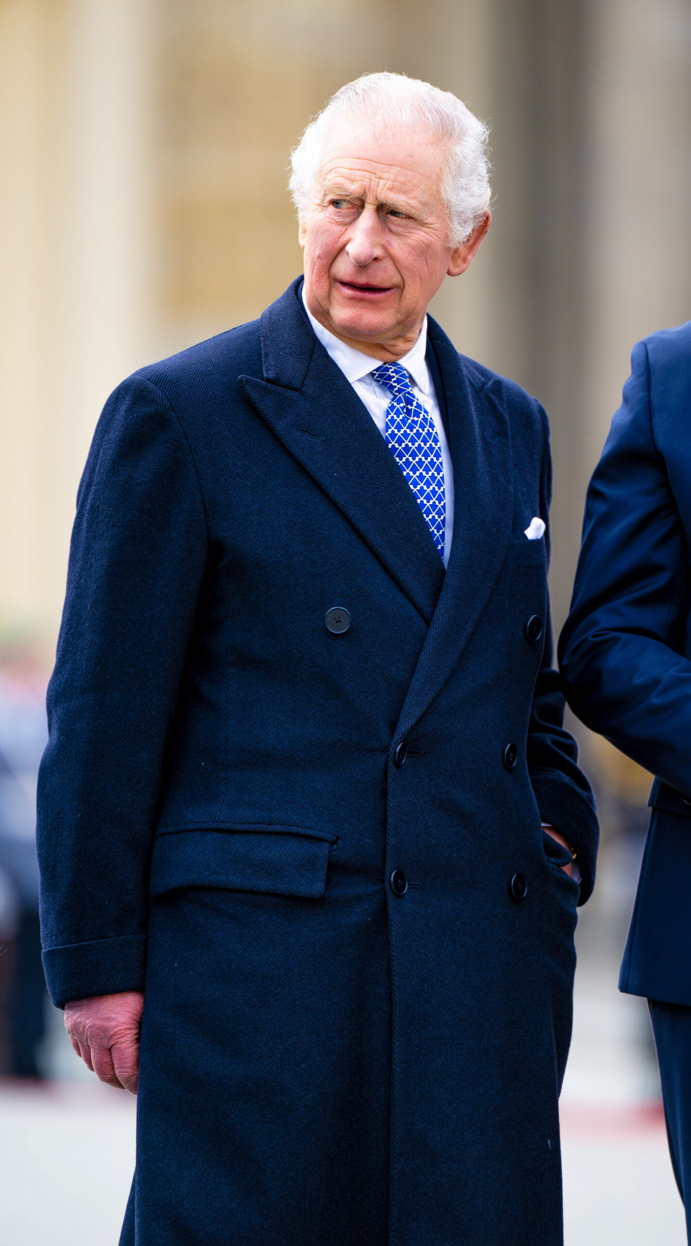 King Charles frowning