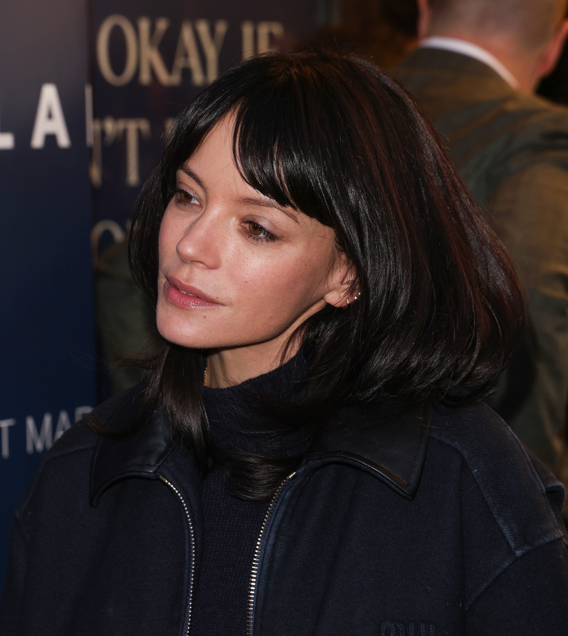 Lily Allen looking in front