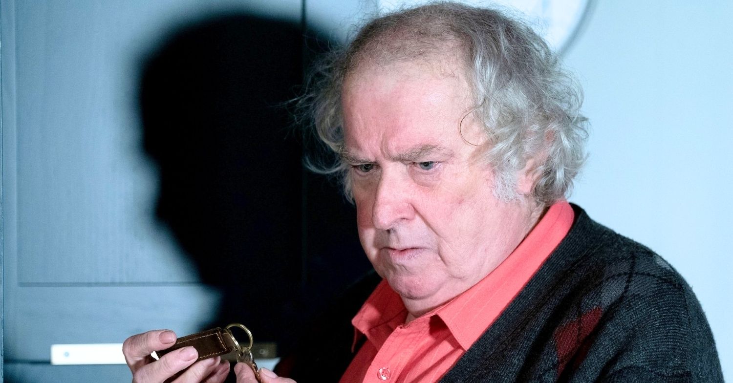 Nigel looks confused as he holds his car keys on EastEnders (Credit: BBC/Composite: ED!)