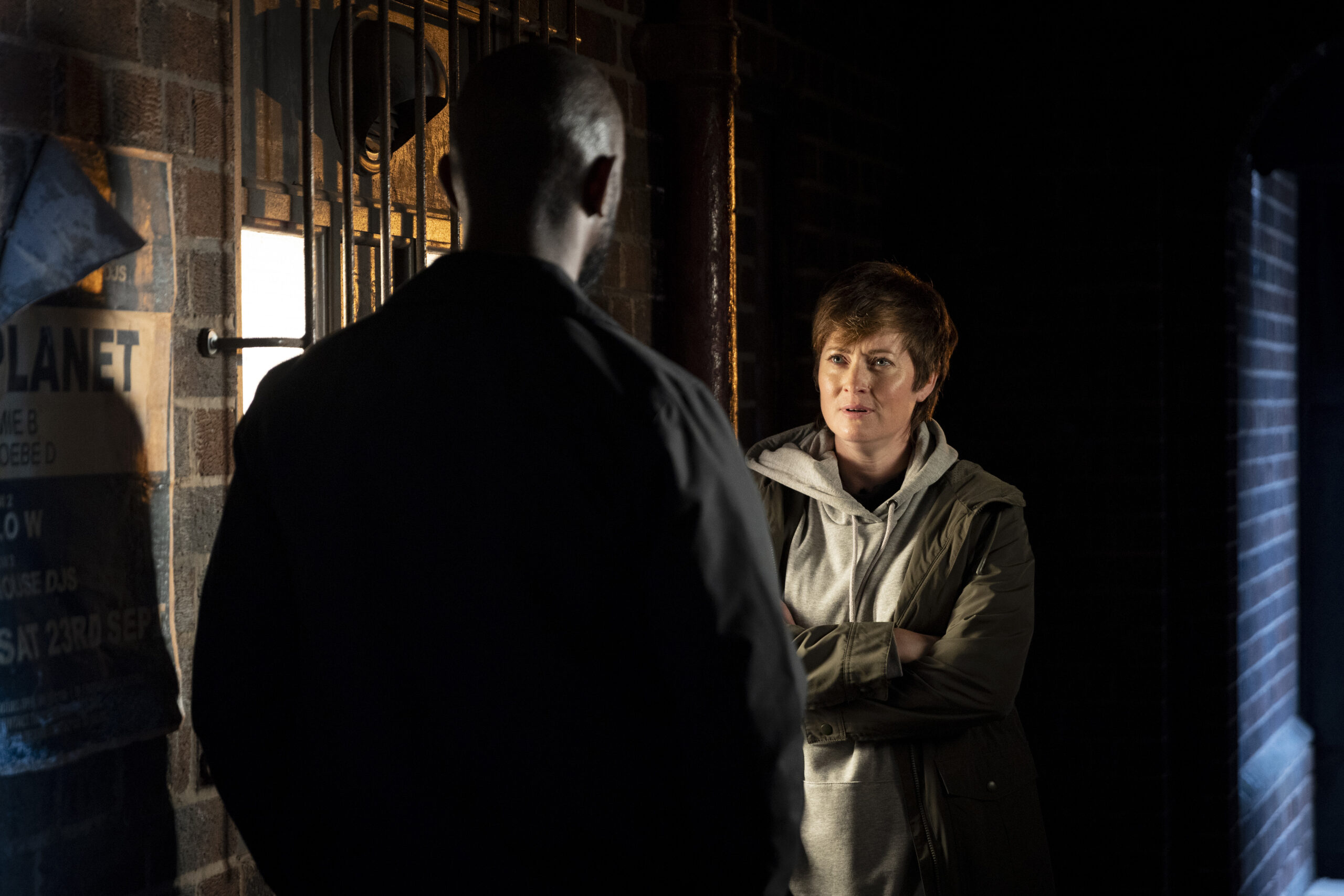 Costello and Becky talking in the dark in Coronation Street