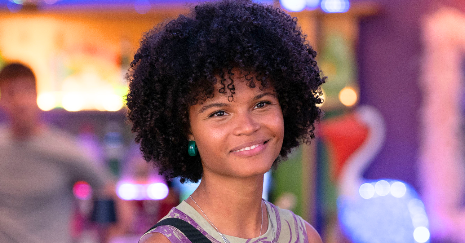 Jasmine smiling at the Albert in EastEnders (Credit: BBC/Composite: ED!)