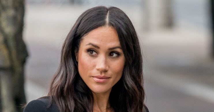 Meghan Markle looking to the side