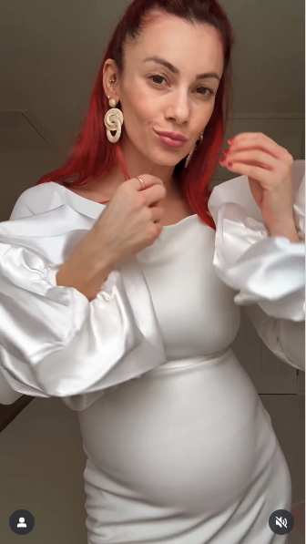 Dianne Buswell in a white dress