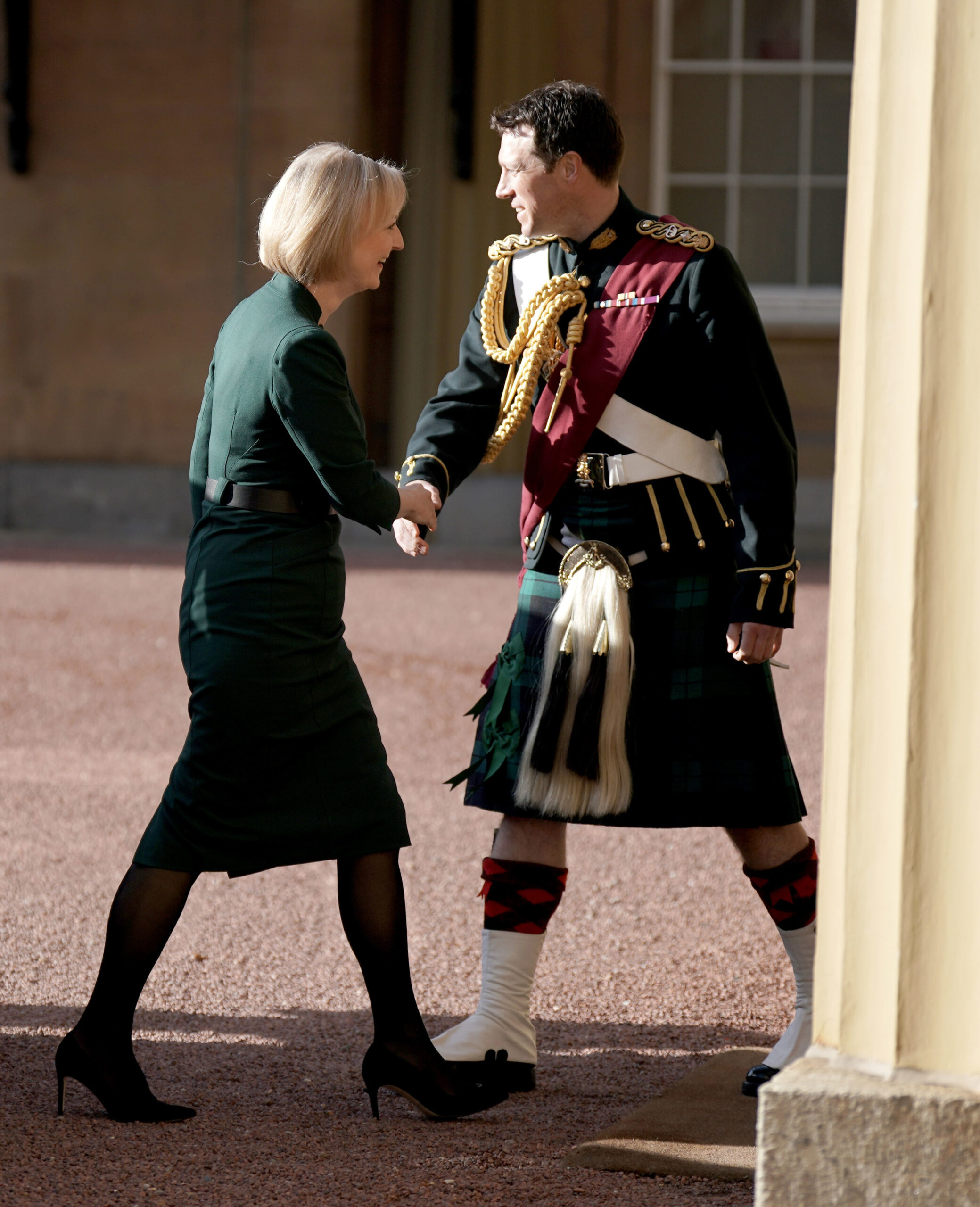 Lieutenant Colonel Johnny Thompson shaking hands with former Prime Minister Liz Truss