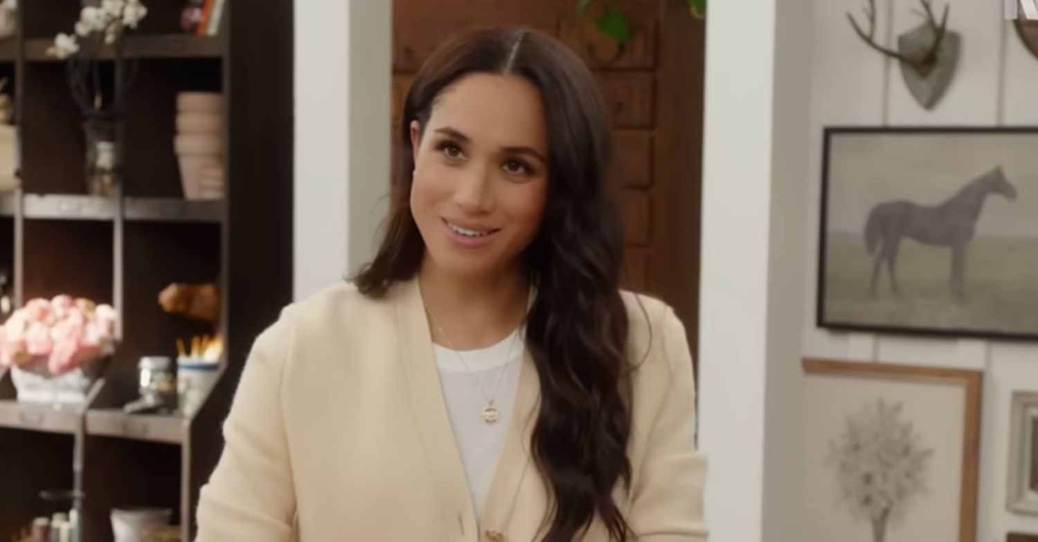 Meghan Markle smiling in her kitchen