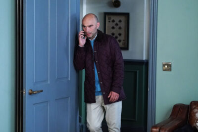 Teddy on the phone in EastEnders
