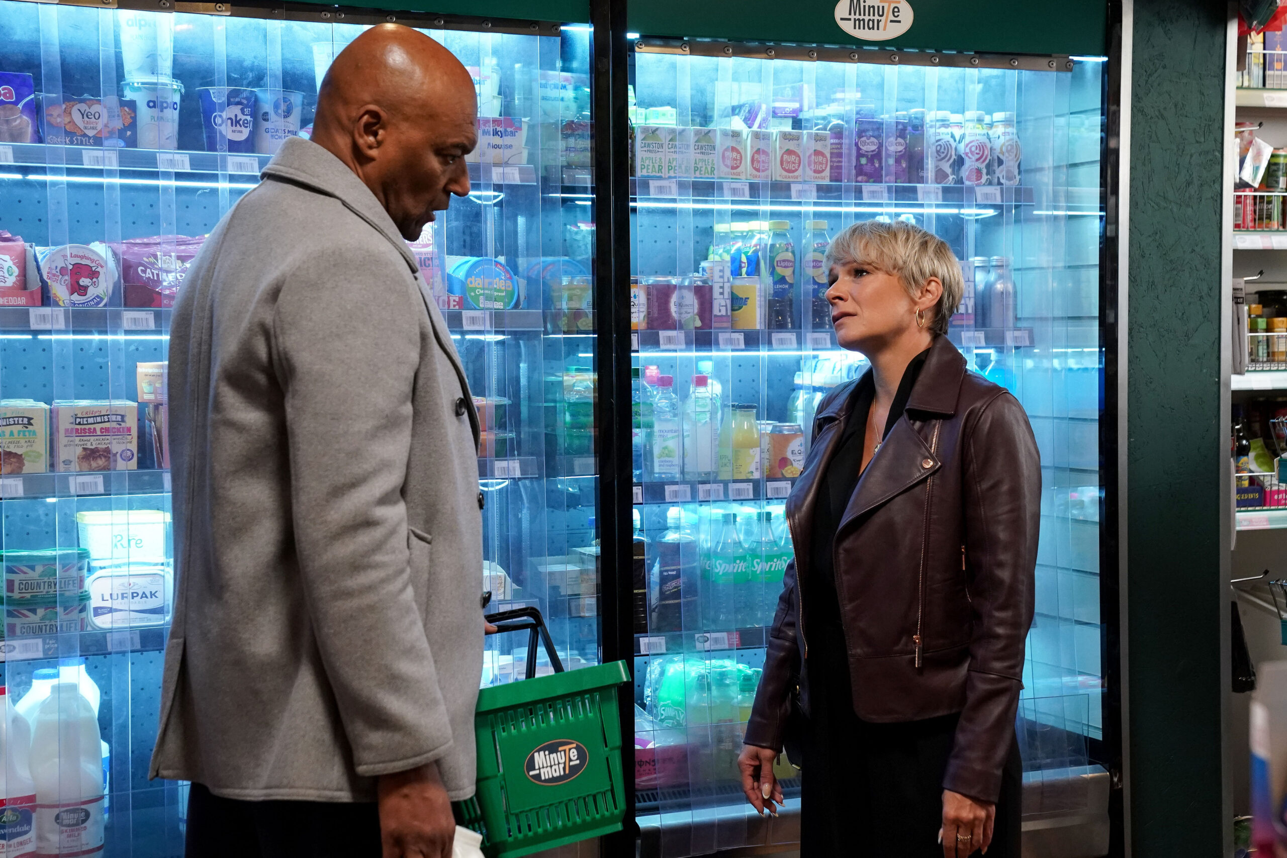 George talks to Nicola in the Minute Mart