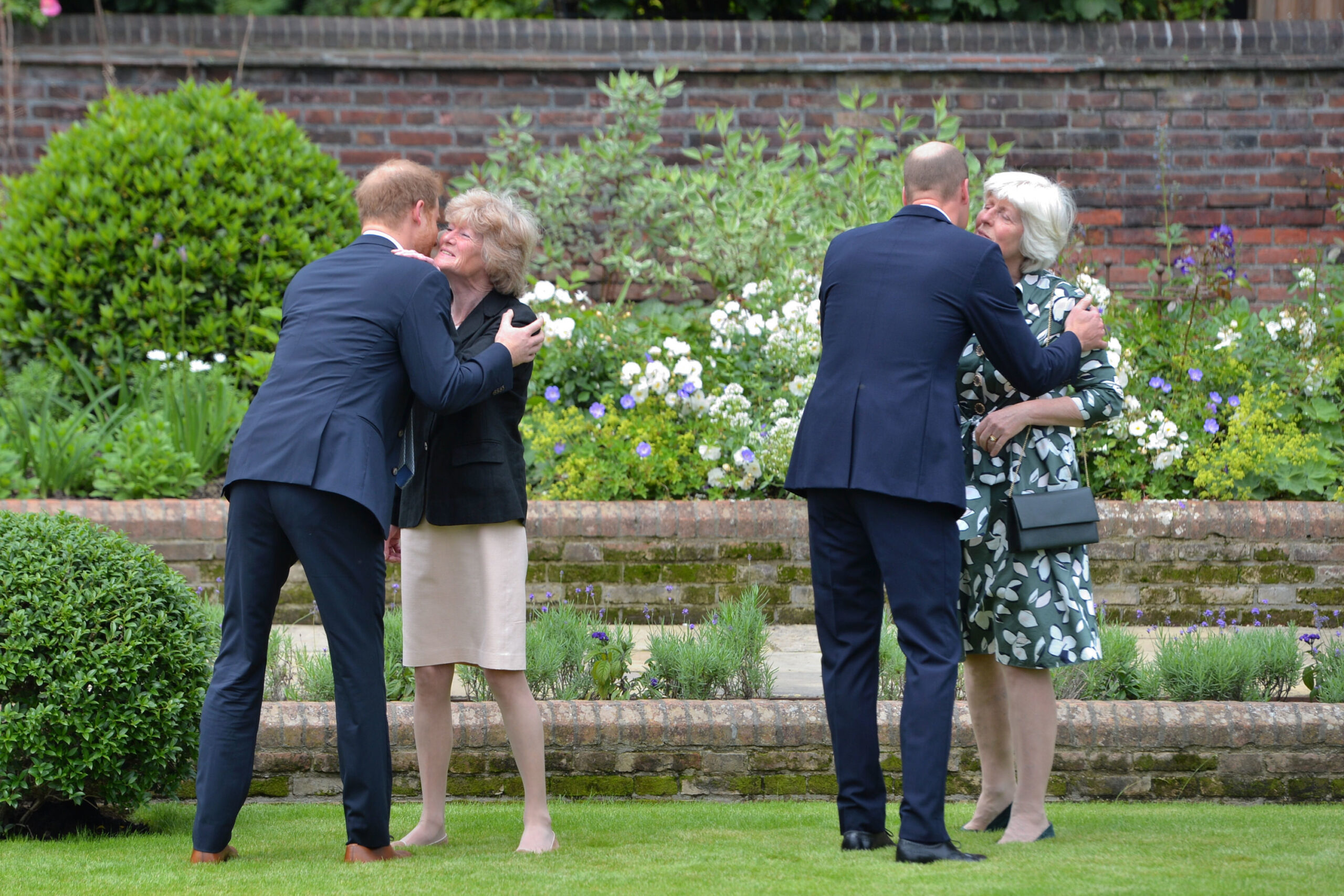 Prince William and Harry with Princess Diana's sisters