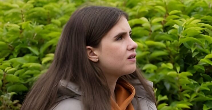 April looks confused in Emmerdale (Credit: ITV)