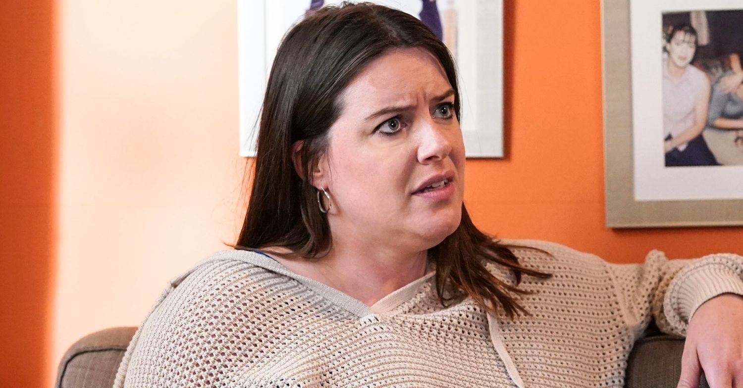 Zoe looks worried in EastEnders (Credit: BBC/Composite: ED!)