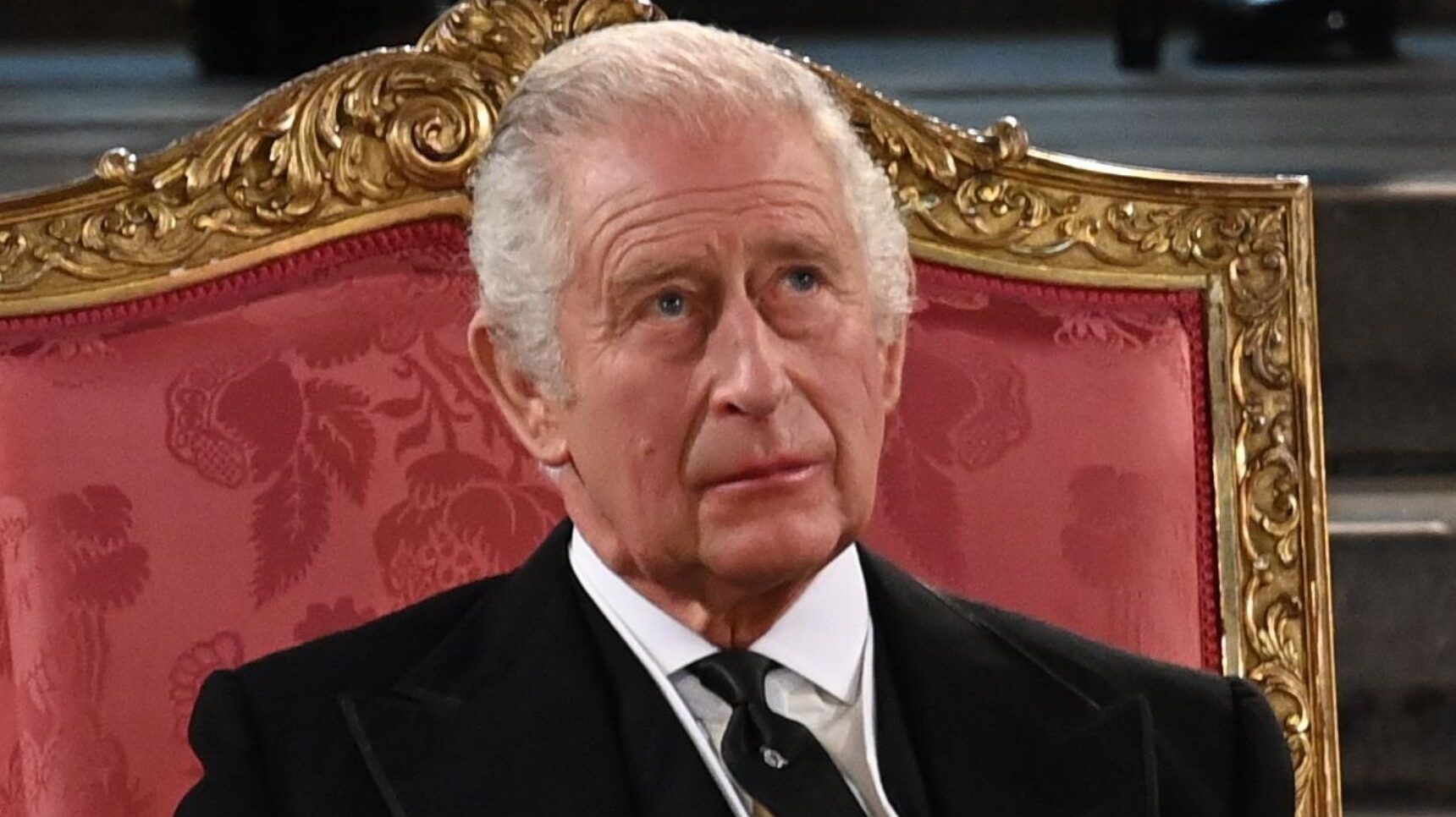 King Charles frowning