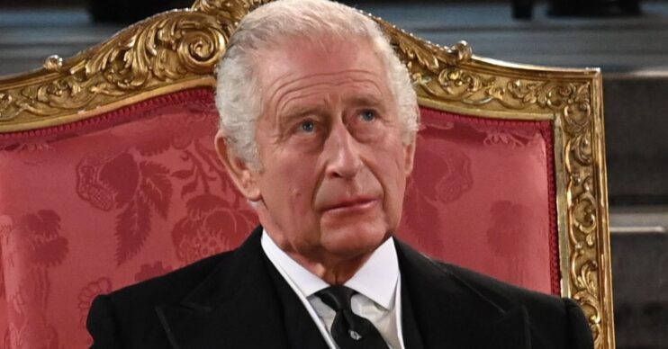 King Charles frowning