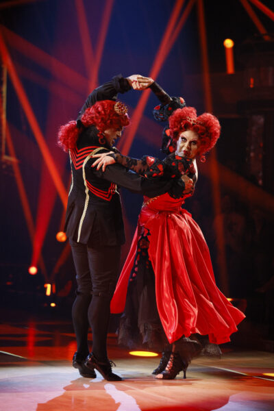 La Voix and Aljaz on Strictly dressed in red and black