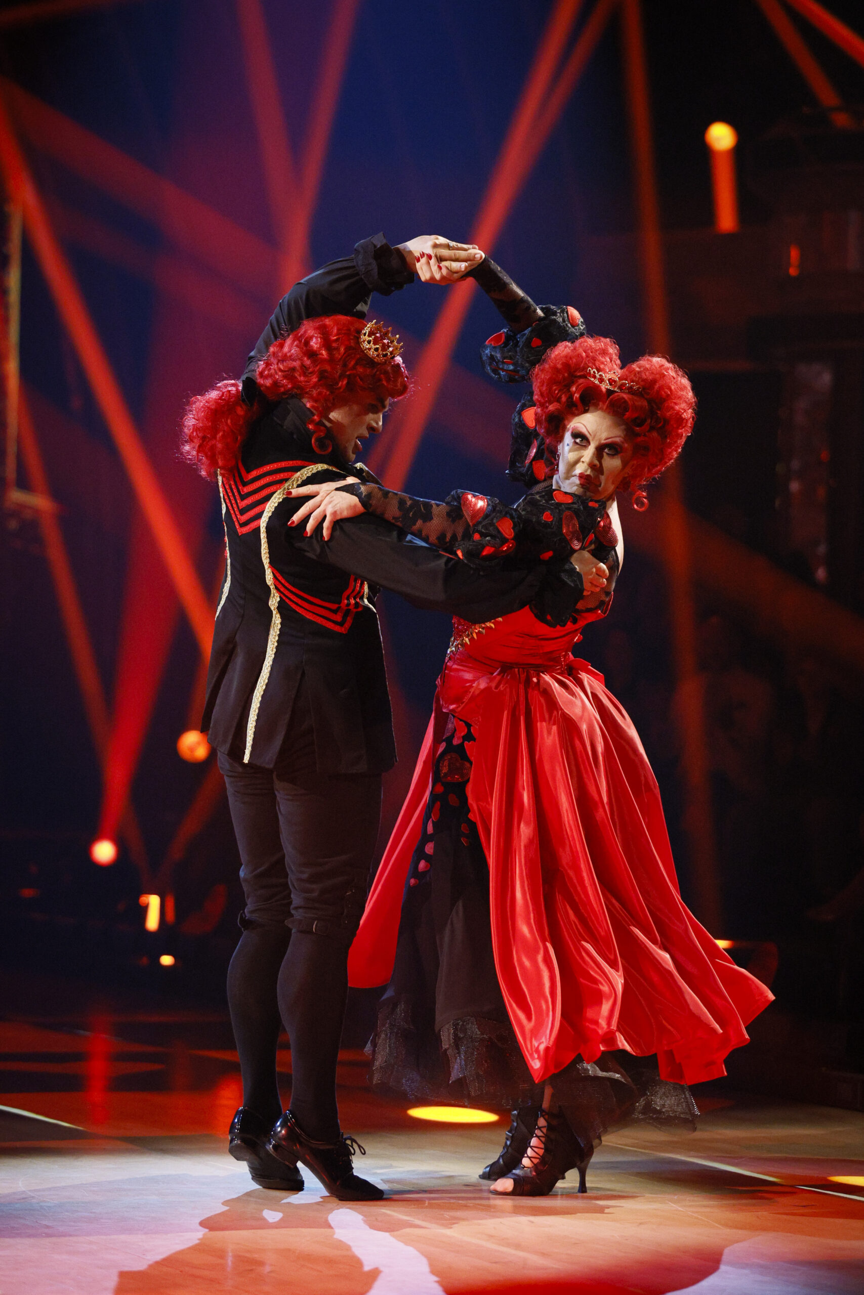 La Voix and Aljaz on Strictly dressed in red and black