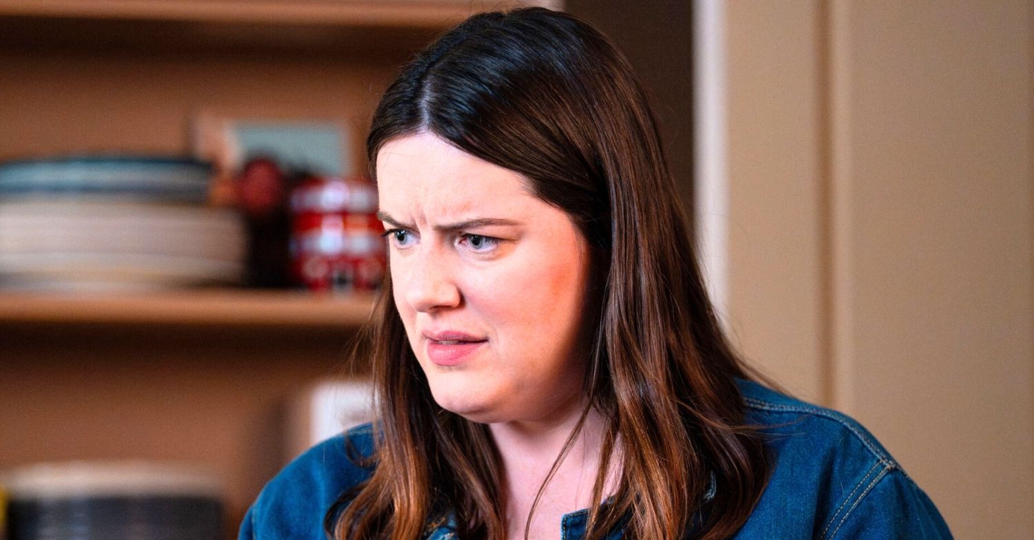 Zoe looks worried in EastEnders (Credit: BBC/Composite: ED!)