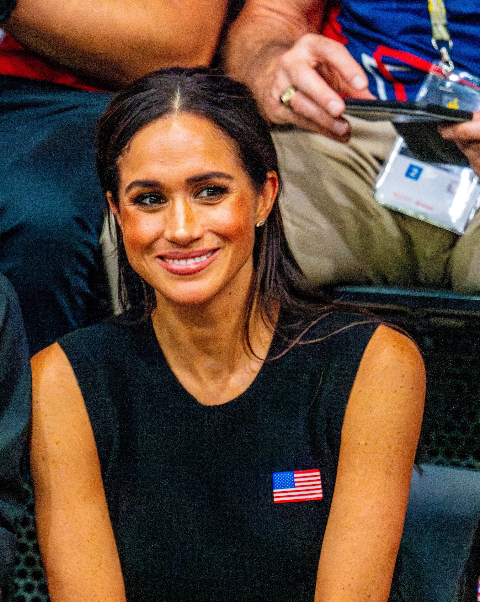 Meghan Markle smiling at an event