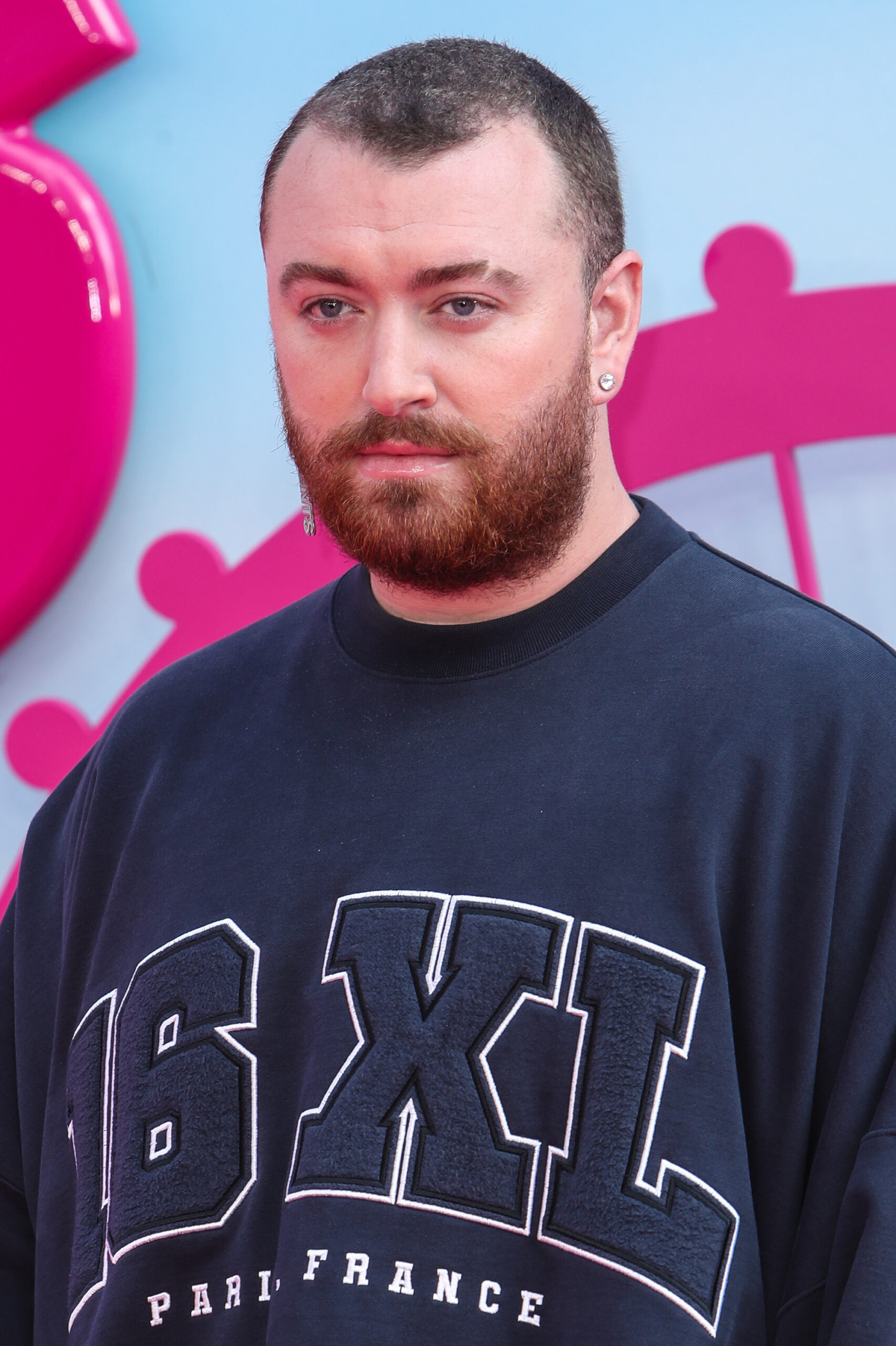 Sam Smith looking in front