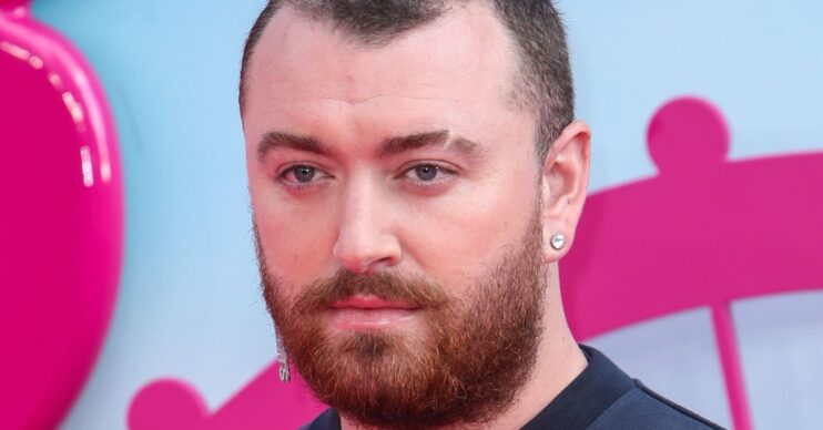 Sam Smith looking in front